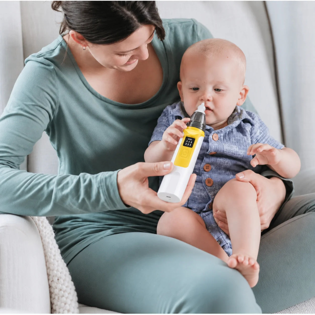 #yellow | Mother using BreatheEase with her baby