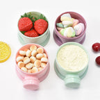 FeedGo containers filled with formula and snacks